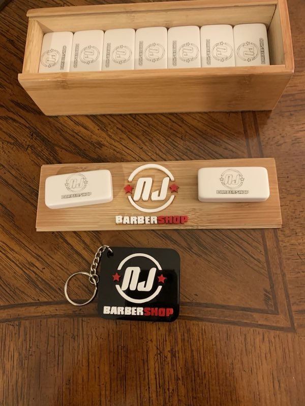 NJ Barbershop branded domino set and keychain