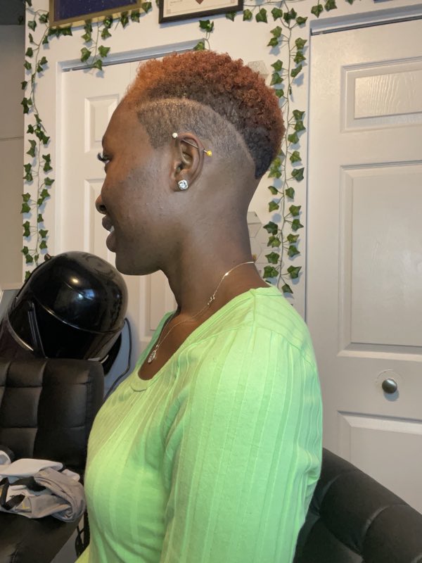 Clean tapered cut with a shaved side design